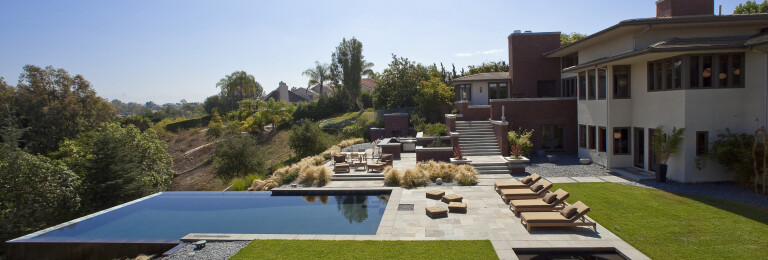 Buckskin Drive Laguna Prairie style luxury home backyard infinity pool & modern terrace design