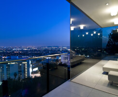 Harold Way Hollywood Hills modern home with glass wall indoor outdoor views