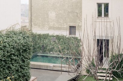 a pool in a private garden