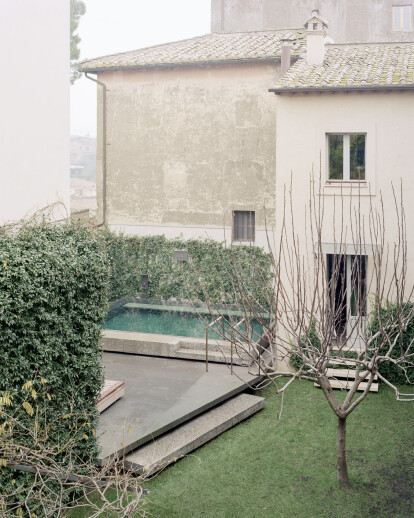 a pool in a private garden