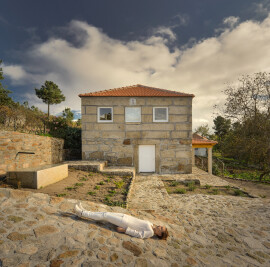 Wood Structure Inside Stone Walls by Corpo Atelier