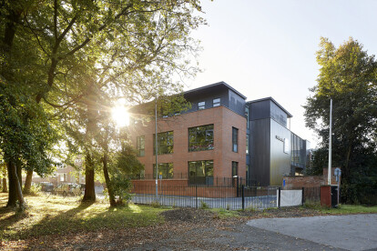 Building at entrance to site