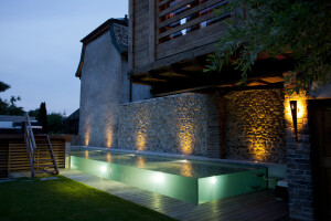 Swimming pool with glass walls