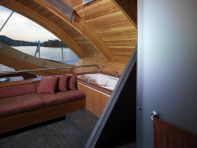 The bathtub and shower looking out over the river.