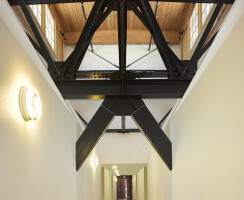 Hallway with Industrial Beams and Breakers