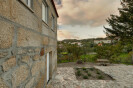 Wood Structure Inside Stone Walls by Corpo Atelier