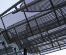 Banker Wire S-12 has a low percent open area, which means it can provide shade without blocking light out entirely.