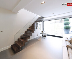 16 tread zig zag profile straight staircase with glass balustrade