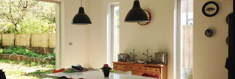 Open-plan Dining room with Tri-fold Doors