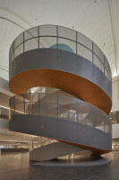 The RealPage headquarters main lobby features a double helix staircase - a unifying element that visually and physically connects the building's four floors. 