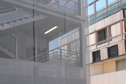 Stair tower cladding with Haver Architectural Mesh.