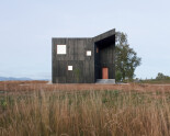 Wood Houses Dressed in Black