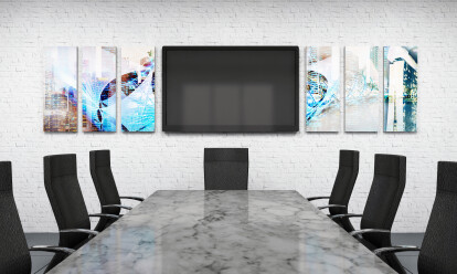 Multiple vertical wall mounts in corporate office conference room.