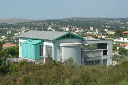 House as seen from upper slope