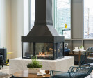 A unique focal point: This 4 sided fireplace by Element4 features views of the fire from all 4 sides.  This is a wonderful design feature for large, communal, spaces.