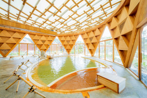 Shigeru Ban realizes Japanese spa resort with signature paper tube columns