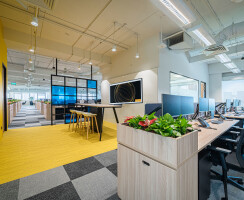 Azqore is a startup office design done stylishly in bold, bright yellow colours by Space Matrix