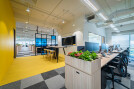 Azqore is a startup office design done stylishly in bold, bright yellow colours by Space Matrix