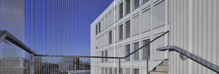 External stair tower cladding with HAVER Architectural Mesh