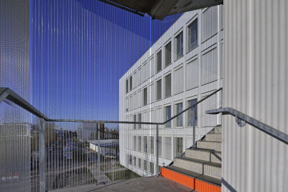 External stair tower cladding with HAVER Architectural Mesh