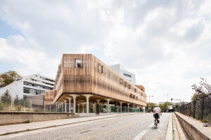 Student residence in Paris responds to its context with rhythmic larchwood slats