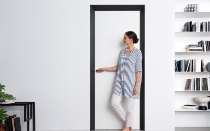 Splayed door frame for flush-to-wall swing door - Red Dot Design Award winner and ADI Design Index member