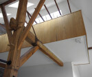 The workspace is on the original oak beams.