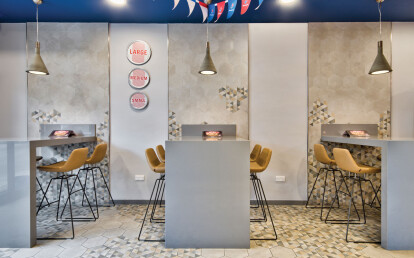 Domino's pizza counter and tables