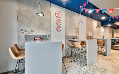 Domino's pizza counter and tables