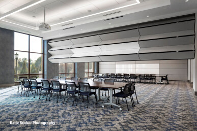 Skyfold Classic movable wall folding from the ceiling automatically to sub-divide conference room