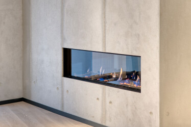 dade design – concrete meets fire. Fireplace with dade PANEL