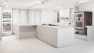 Cooking environment made of bright white concrete for the cooking studio in Zurich