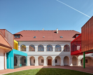 Bold and colourful elementary school additions are playfully incremental