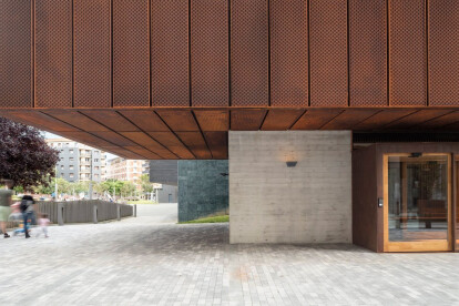 New Zubiaur School of Music a visual and spatial interplay between overlapping walls and existing building context