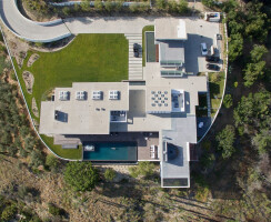 Benedict Canyon Beverly Hills modern hillside mansion aerial view