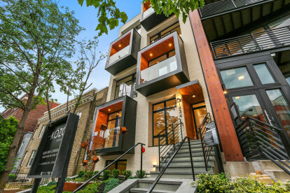 Boutique condominium development in Washington DC engages the street with playful façade design