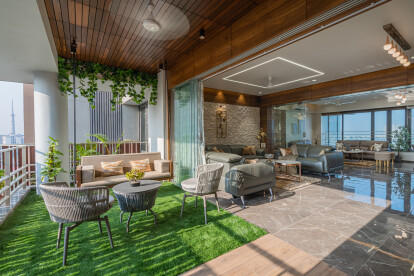One is welcomed by a refreshing garden balcony that keeps the apartment ventilated throughout the day. The garden entrance is creatively done, distinctive use of wood in flooring and ceiling with little green patch looks mesmerizing.