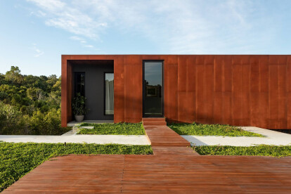 Corten clad home designed with green space in mind