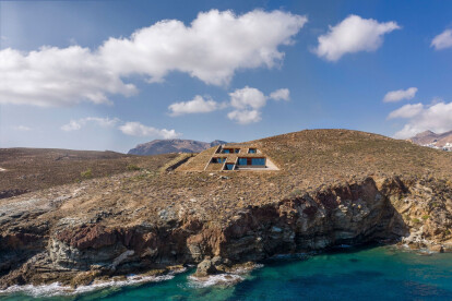 NCAVED house embeds itself into a rocky, windy, island site