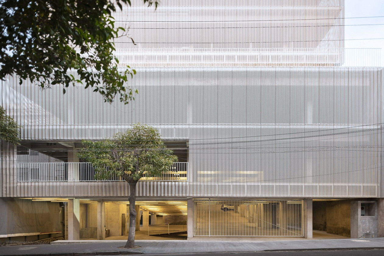 Clean concrete superstructure of Estación San José embraces its urban context