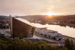 Snøhetta wraps co-working space with thermally-modified pine for Powerhouse Telemark