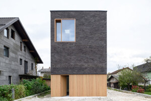 Double Brick House takes a sculptural approach to a narrow site