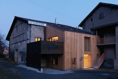 House CCB in Switzerland sees the transformation of a barn into a luminous contemporary residence