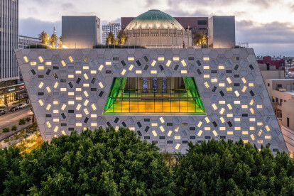 OMA draws from adjacent dome interior to wrap Audrey Irmas Pavilion with 1,230 GFRC hexagonal panels