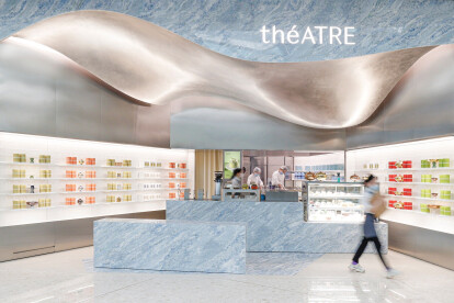 Shanghai’s théATRE tea shop features a curved handmade ceiling of folded steel sheets