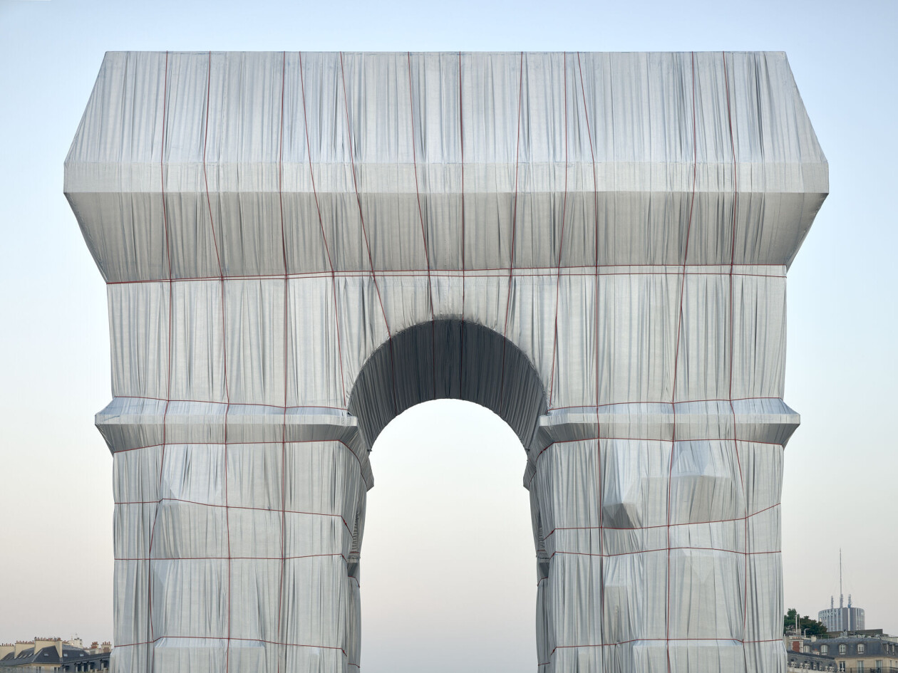 Christo realizes the vision of a wrapped L’Arc de Triomphe