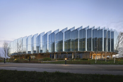 Herzog & de Meuron unveil a landmark glass building with their new global research and development facility for AstraZeneca