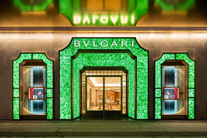 Dramatic Bulgari flagship by MVRDV showcases a green, jade-like facade of recycled champagne and beer bottles