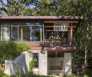 Cantilevered porch supported by a board formed concrete pier