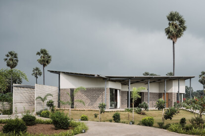 TEJ House by Neogenesis + Studi0261 achieves a striking contemporary expression with conventional, locally available materials